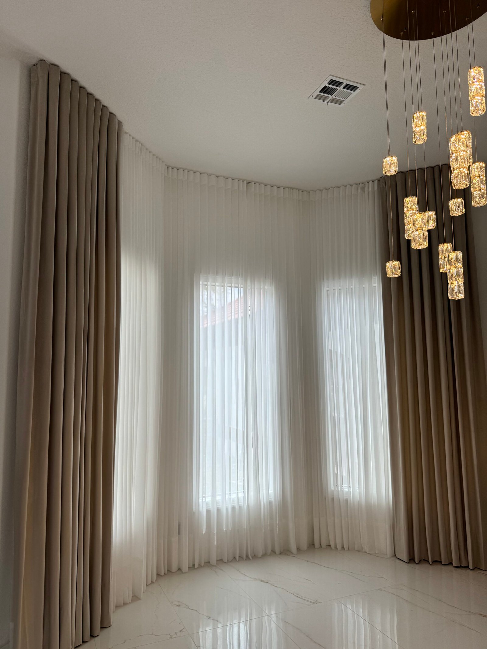 sheer and blackout curtains showing the difference in light and privacy