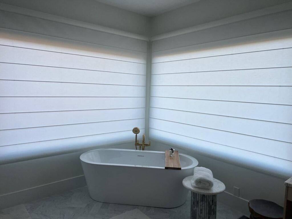 motorized roller shades operating smoothly on wide windows