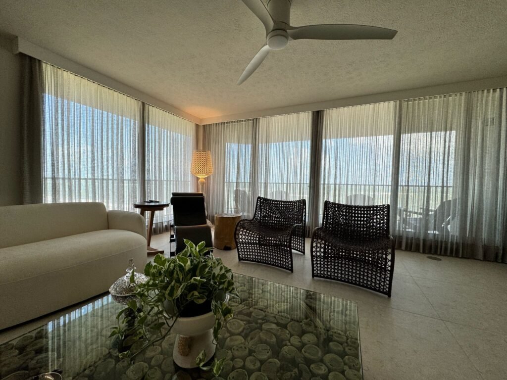 sheer curtains filtering natural light in a bright living room